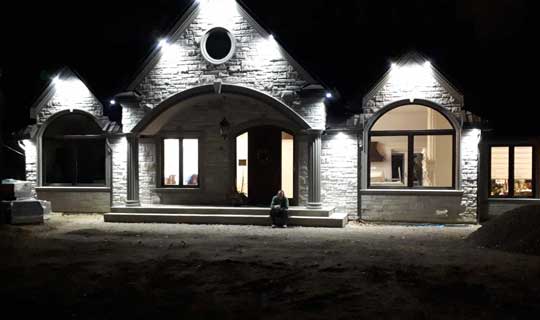 Completed exterior of house at night